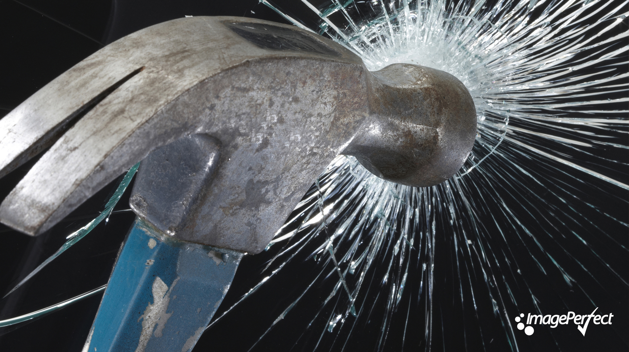 Hammer hitting glass with ImagePerfect logo