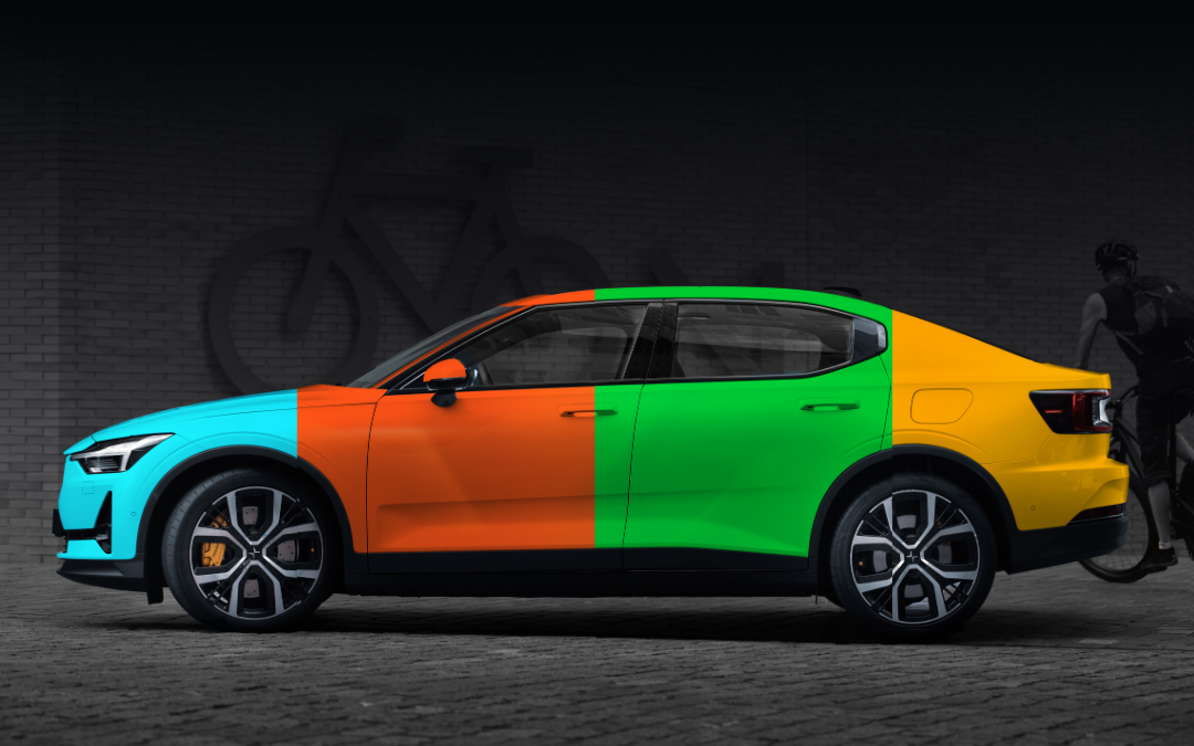 Polestar car wrapped in AUTO SE films in blue, orange, green and yellow colour. It's on a dark black brick background