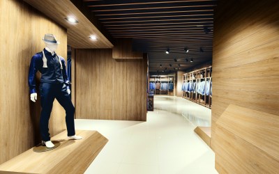A clothes shop with walls wrapped in wood effect decor film