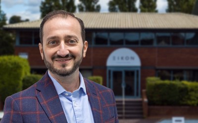 Stefano Nigrone, CEO of Eikon, standing in front of a manufacturing building