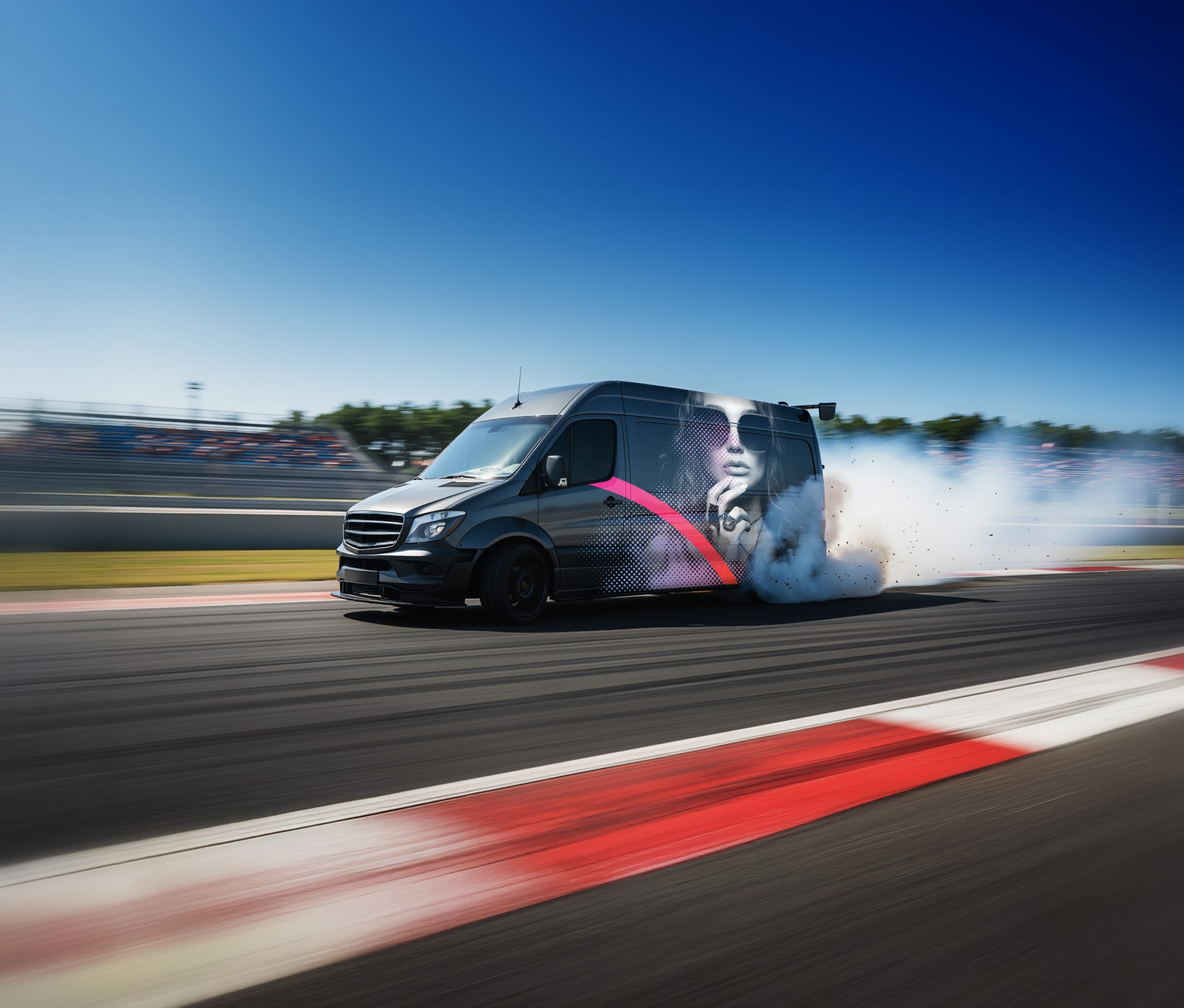 A dark gray Mercedes-Benz Sprinter van drifting on a race track, surrounded by white smoke and debris from its rear tires. The van features a graphic of a woman wearing sunglasses, overlaid with pink and white patterns. The scene includes a red and white striped curb, blurred grandstands, and a clear blue sky