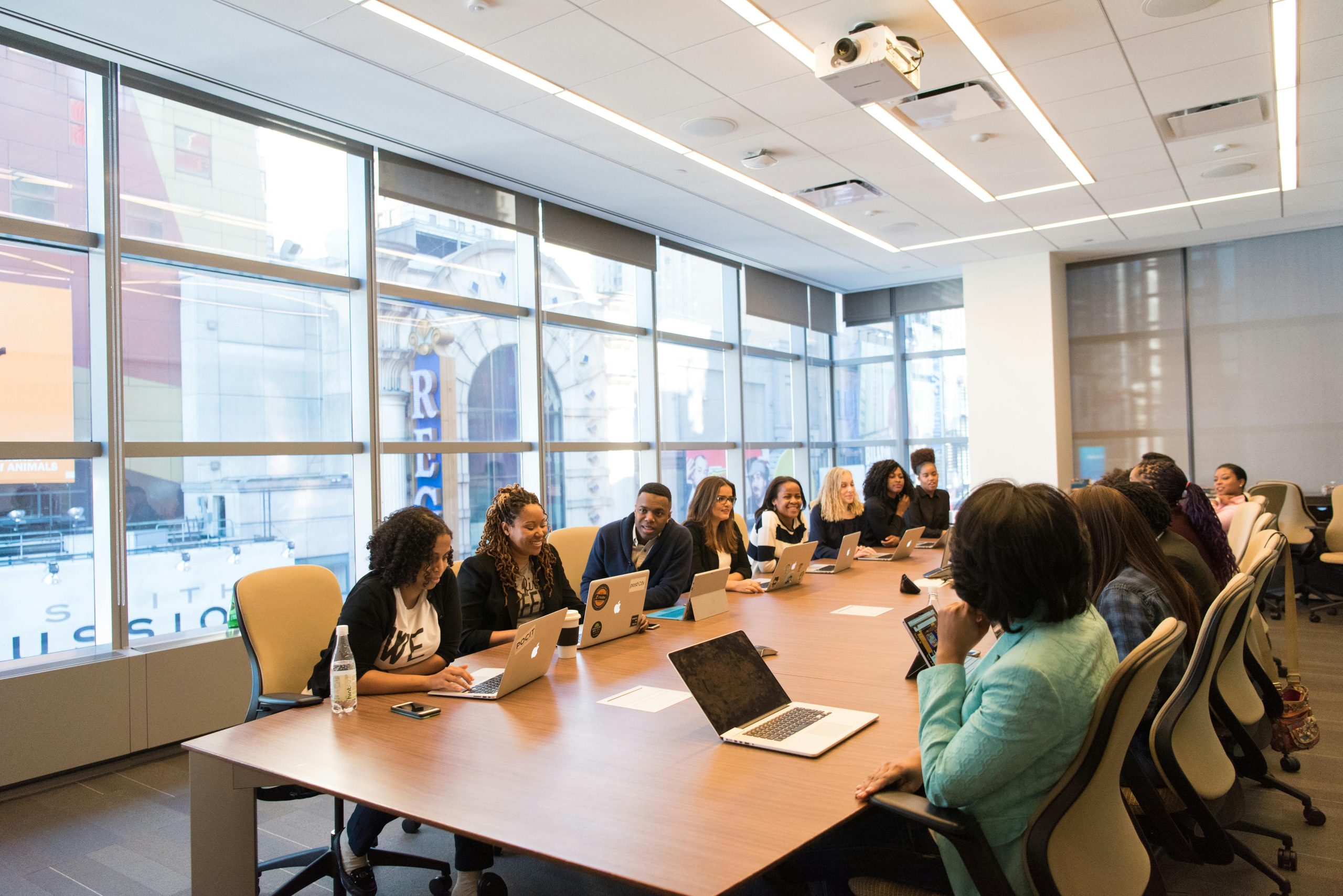 An office meeting room with sunny windows